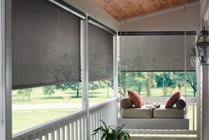 Outdoor solar shades installed by Benjamin Draperies