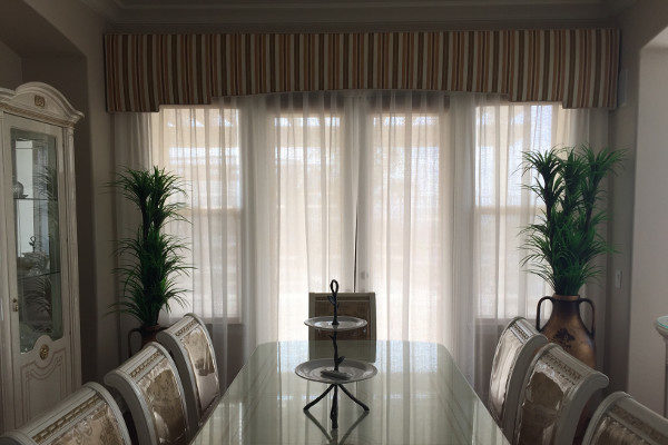 Custom drapes in a dining room