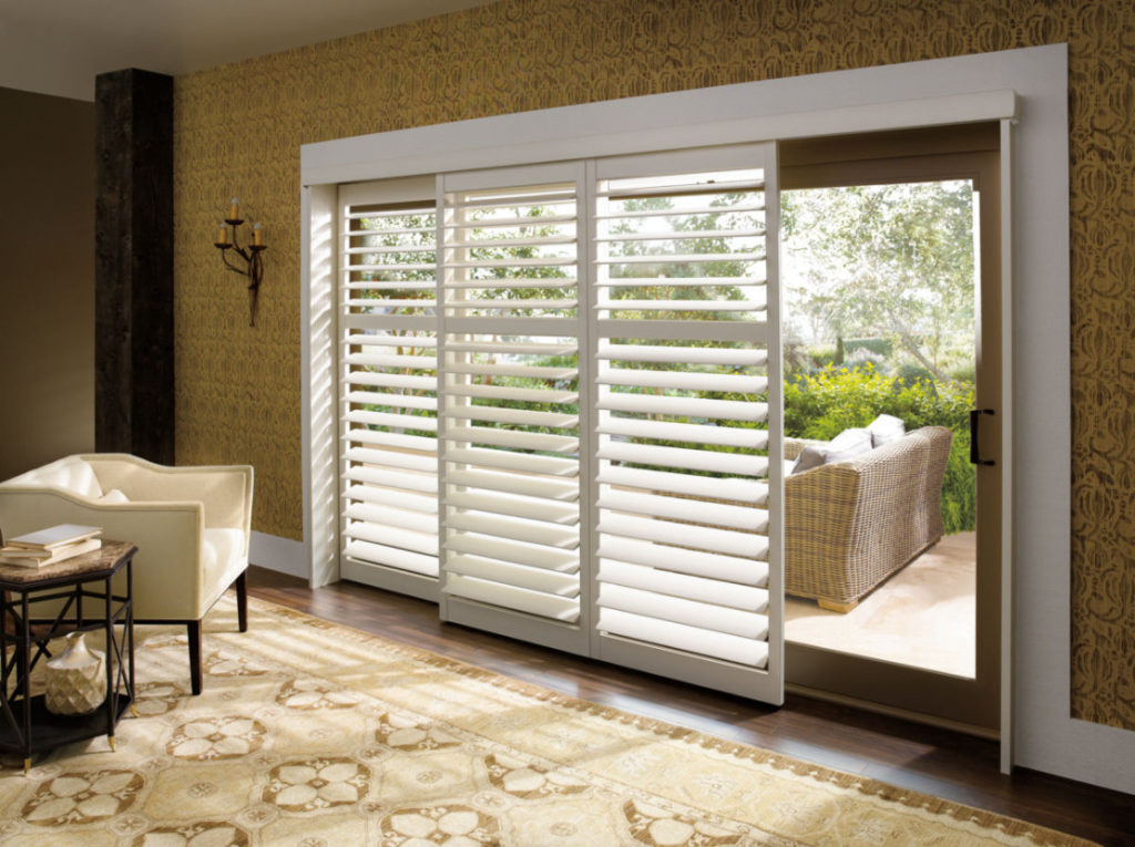 Polysatin shutters on a large glass door