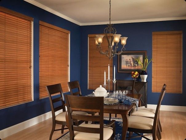 Wood Blinds used to cover windows in a dining room